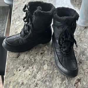 Woman’s winter boots snow tec.